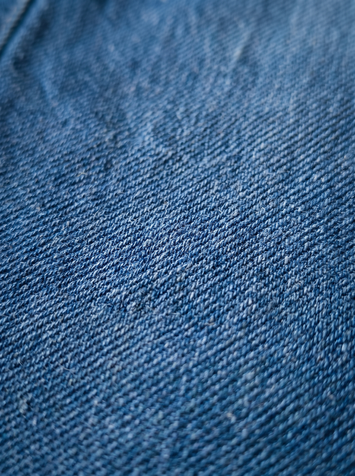 The Classic Straight — close-up detail, vintage indigo wash