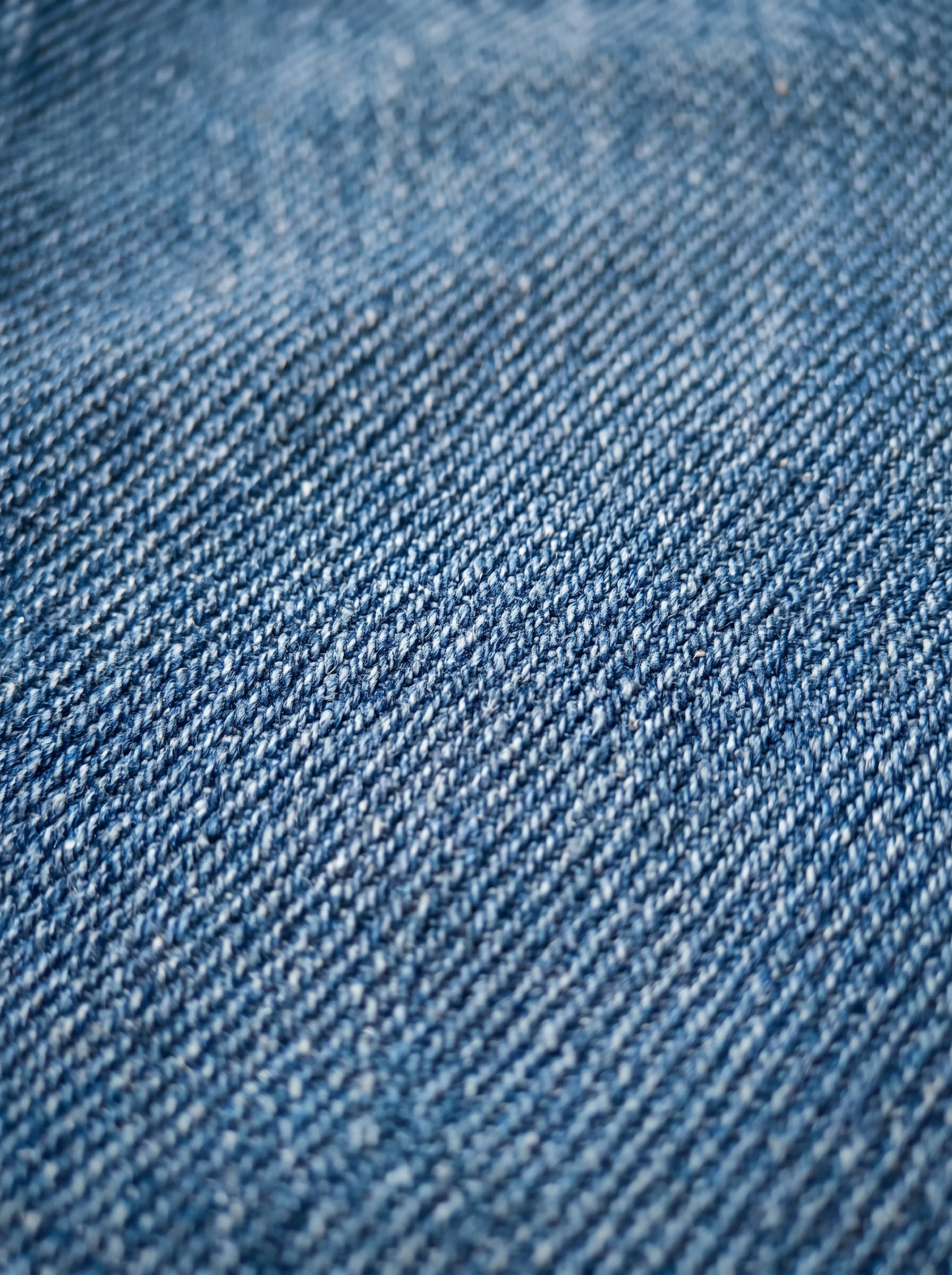 The Patch Flare — fabric texture macro, 100% cotton denim weave