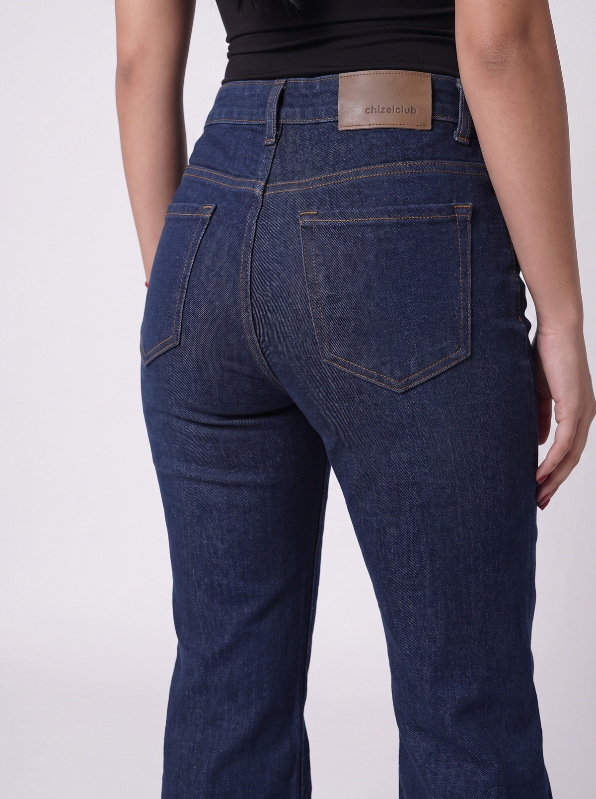 The Raw Indigo Flare — fabric texture macro, 100% cotton denim weave